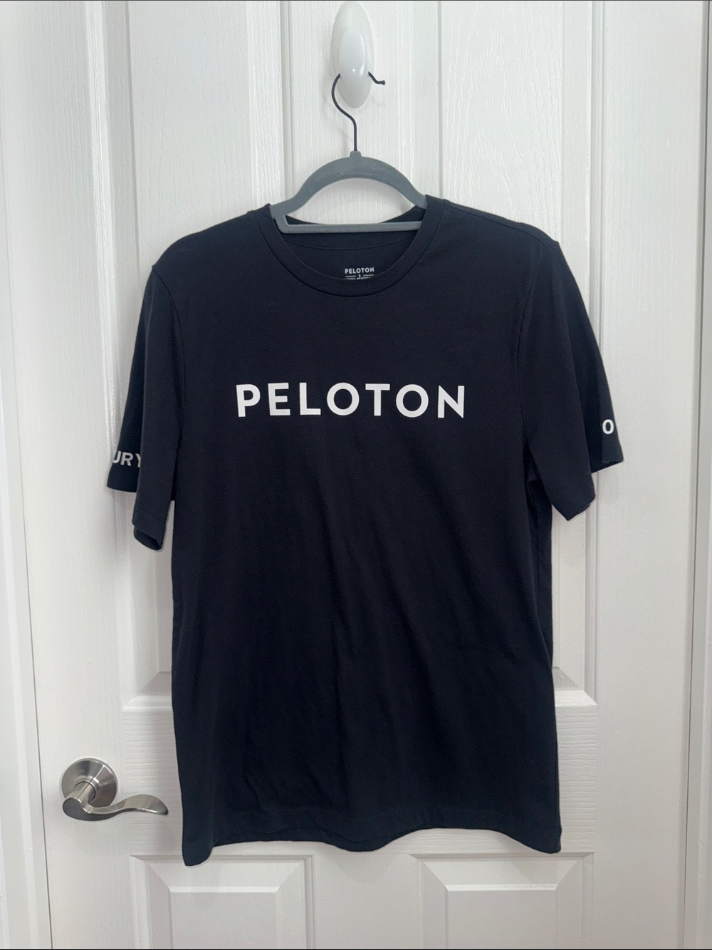 Peloton Black Tee with White Logo - Century & 100 on Sleeves - Men’s Small